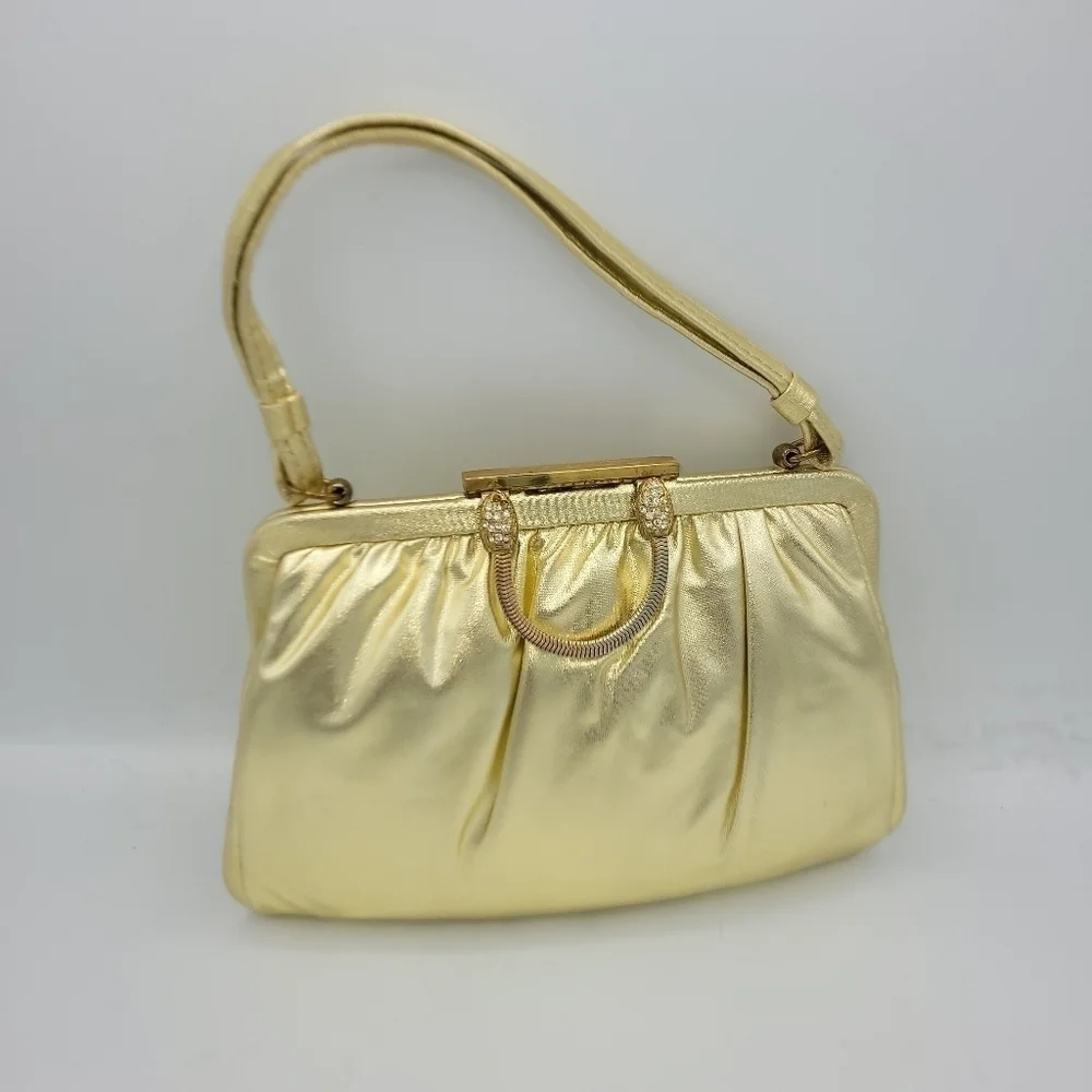 Vintage Andé Gold Clutch With Rhinestone Details Clasp.